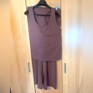 Athleisure 2pc set. Cropped racer back tank top and high waisted flair pants.